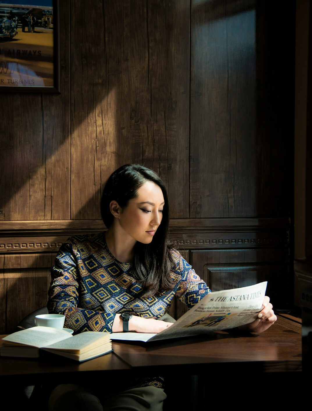 woman reading old documents
